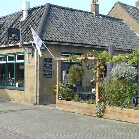 Eetcafe/Pension Nooitgedacht Strijen Esterno foto