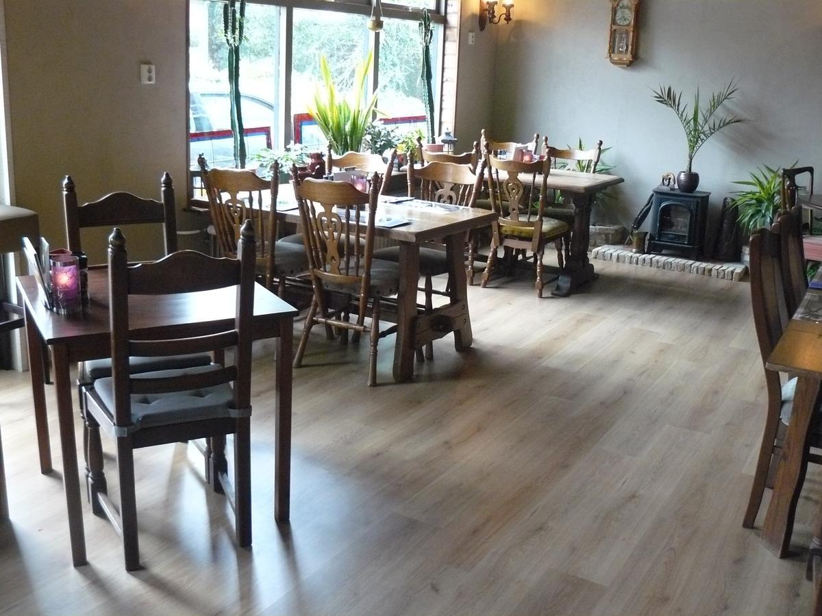 Eetcafe/Pension Nooitgedacht Strijen Esterno foto